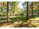 Large backyard with mature trees and plenty of green space at 2690 Old Hickory Nw Dr, Marietta, GA 30064