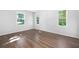 Spacious bedroom featuring hardwood floors and multiple windows at 2690 Old Hickory Nw Dr, Marietta, GA 30064