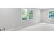 Bright, empty bedroom with neutral carpet and a large window offering great natural light at 2690 Old Hickory Nw Dr, Marietta, GA 30064
