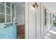 Bright entryway showcases a light blue door, hardwood floors, and ample natural light for a warm welcome at 2690 Old Hickory Nw Dr, Marietta, GA 30064