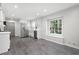 Spacious kitchen with stainless steel appliances, white cabinets, and a large window for ample natural light at 2690 Old Hickory Nw Dr, Marietta, GA 30064