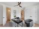 Bright home office featuring a modern desk, ample lighting, and a calming color scheme at 3072 Kelly St, Scottdale, GA 30079