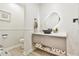 Modern bathroom with floating vanity and unique wall tile at 4083 Audubon Dr, Marietta, GA 30068