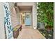 Welcoming entryway with light blue door and a small bench at 4083 Audubon Dr, Marietta, GA 30068