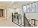 Upper hallway with built-in workspace and view at 4083 Audubon Dr, Marietta, GA 30068