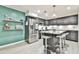 Modern kitchen featuring stainless steel appliances and an island with seating at 4083 Audubon Dr, Marietta, GA 30068