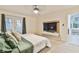 Spacious main bedroom with TV and access to deck at 4083 Audubon Dr, Marietta, GA 30068