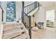 Modern staircase with dark wood railings and carpeted steps at 4083 Audubon Dr, Marietta, GA 30068