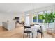 Bright dining area with round table and four chairs at 416 Glen Iris Ne Dr, Atlanta, GA 30308