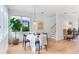 Modern dining area with round table and four black chairs at 416 Glen Iris Ne Dr, Atlanta, GA 30308