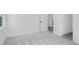 Bedroom with carpet flooring, white walls, and an en suite bathroom at 6210 Misty Hill Ln, Buford, GA 30518