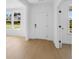 Inviting entryway with hardwood floors and natural light at 6210 Misty Hill Ln, Buford, GA 30518
