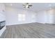 Spacious living room with fireplace and hardwood floors at 1440 Fairview Rd, Ellenwood, GA 30294