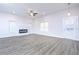 Spacious living room with fireplace and hardwood floors at 1440 Fairview Rd, Ellenwood, GA 30294