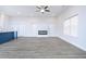 Spacious living room with fireplace and hardwood floors at 1440 Fairview Rd, Ellenwood, GA 30294