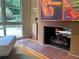 Brick fireplace with large-scale art and access to the backyard at 1719 Barnesdale Ne Way, Atlanta, GA 30309