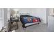 Bedroom featuring a fan, bed, desk, window, and grey walls at 1920 Pearson St, Loganville, GA 30052