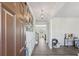Welcoming foyer features wood floors, decorative moldings, and a view of the living area at 1920 Pearson St, Loganville, GA 30052