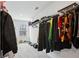Walk-in closet with wire shelving, carpet and an abundance of storage space at 1920 Pearson St, Loganville, GA 30052