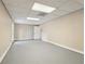 Finished basement room with neutral walls and vinyl flooring at 1684 Pierce Arrow Pkwy, Tucker, GA 30084