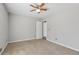 Spacious bedroom with carpet and ceiling fan at 1684 Pierce Arrow Pkwy, Tucker, GA 30084