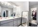 Modern bathroom with double vanity and walk-in closet at 2829 Ridgeview Sw Dr, Atlanta, GA 30331