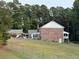 House with large backyard and wooded area at 1294 Dogwood Rd, Snellville, GA 30078
