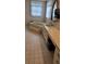 Spacious bathroom featuring soaking tub, sink with storage, and ample counter space at 1294 Dogwood Rd, Snellville, GA 30078