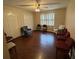 Common area with wood-look floors and comfortable seating at 1294 Dogwood Rd, Snellville, GA 30078