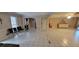 Large common area with tiled floors and access to other rooms at 1294 Dogwood Rd, Snellville, GA 30078