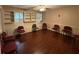 Common area with wood-look floors and built-in shelving at 1294 Dogwood Rd, Snellville, GA 30078