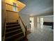 Bright entryway with staircase and tiled floors at 1294 Dogwood Rd, Snellville, GA 30078