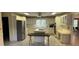 Spacious kitchen with ample cabinetry and an island at 1294 Dogwood Rd, Snellville, GA 30078