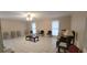 Spacious living room with tiled floors and multiple windows at 1294 Dogwood Rd, Snellville, GA 30078