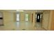 Spacious living room featuring tile floors, an open layout, and access to multiple rooms at 1294 Dogwood Rd, Snellville, GA 30078