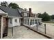 Home with sunroom, deck and fenced pool at 1294 Dogwood Rd, Snellville, GA 30078