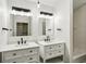Bathroom boasts double vanity with white cabinets at 2192 Spink St, Atlanta, GA 30318