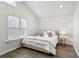 Spacious bedroom with light wood flooring and large windows at 2192 Spink St, Atlanta, GA 30318