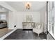 Bright entry with tile flooring, decorative console table, and comfortable seating at 2192 Spink St, Atlanta, GA 30318