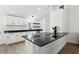 White kitchen with granite countertops and stainless steel appliances at 2192 Spink St, Atlanta, GA 30318