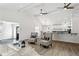 Open living area with hardwood floors, kitchen views, and ceiling fan at 2192 Spink St, Atlanta, GA 30318