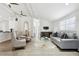 Spacious living room with hardwood floors, comfortable seating, and a large TV at 2192 Spink St, Atlanta, GA 30318