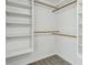 Large walk-in closet with shelving and hanging rods at 2192 Spink St, Atlanta, GA 30318