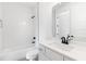 Modern bathroom featuring white subway tile, vanity with sink, and fixtures at 3076 Kelly St, Scottdale, GA 30079