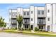 New homes with modern design, landscaping and paved sidewalk at 3076 Kelly St, Scottdale, GA 30079