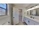 Updated bathroom with a modern vanity and black accents at 3677 Platina Park Ct, Decatur, GA 30034