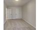 Simple bedroom with carpet and ample closet space at 3677 Platina Park Ct, Decatur, GA 30034