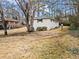 Spacious backyard with mature trees surrounding property at 2771 Ridge Park Dr, Tucker, GA 30084
