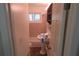 Bathroom featuring a pedestal sink and tiled shower at 2771 Ridge Park Dr, Tucker, GA 30084
