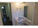 Bathroom featuring double sinks, ample lighting, and a tiled shower at 2771 Ridge Park Dr, Tucker, GA 30084